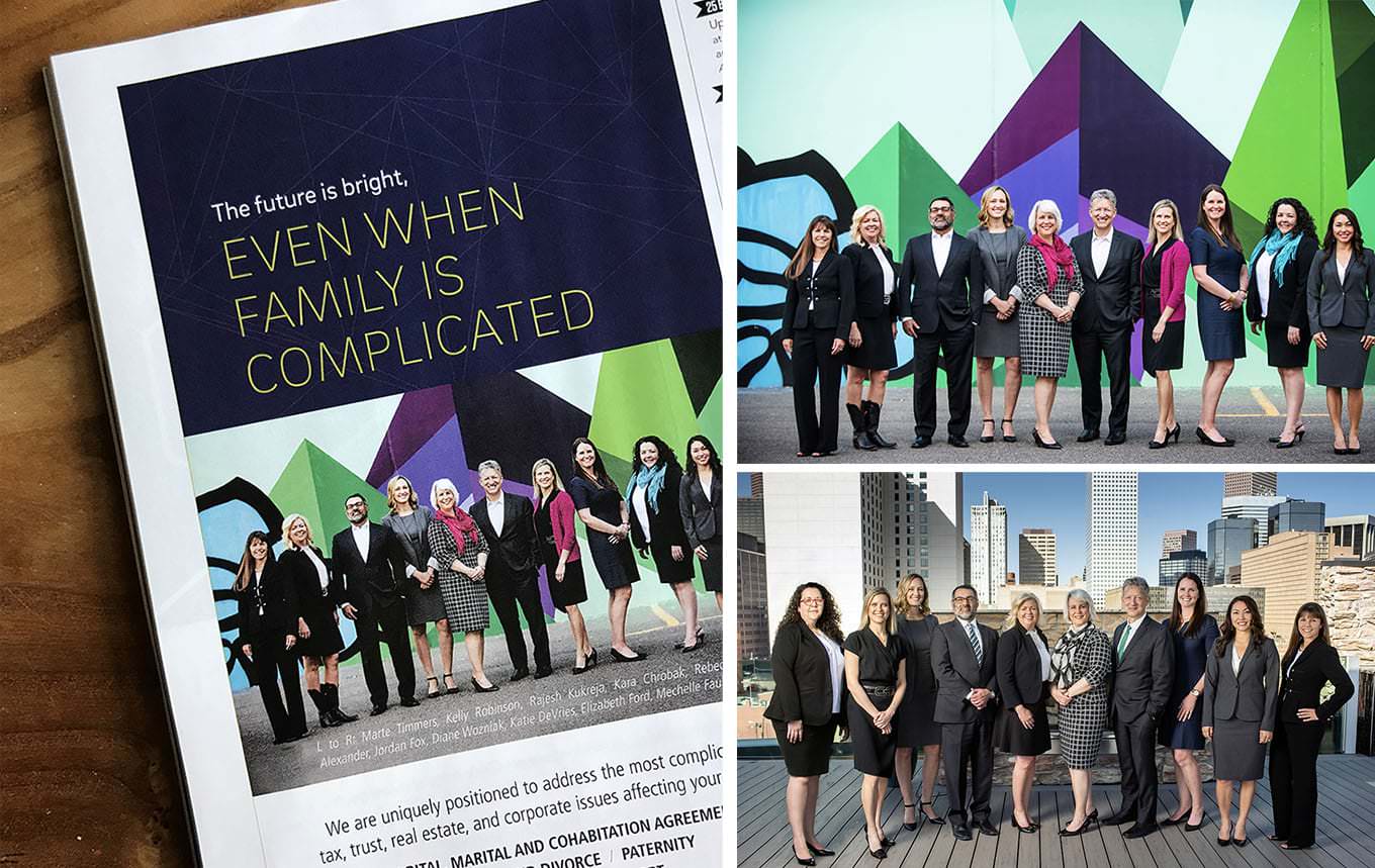 a group of people in business attire are standing in front of a building.