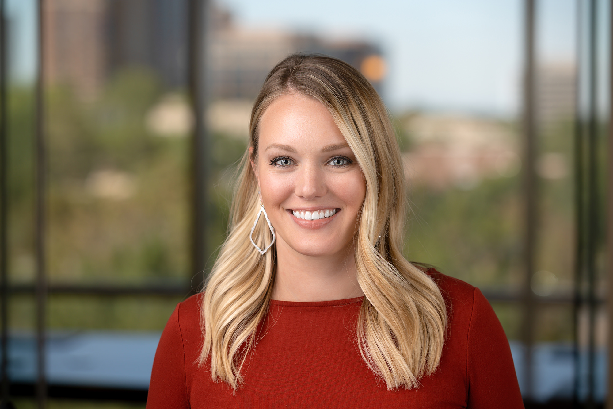 corporate headshots on blurred background