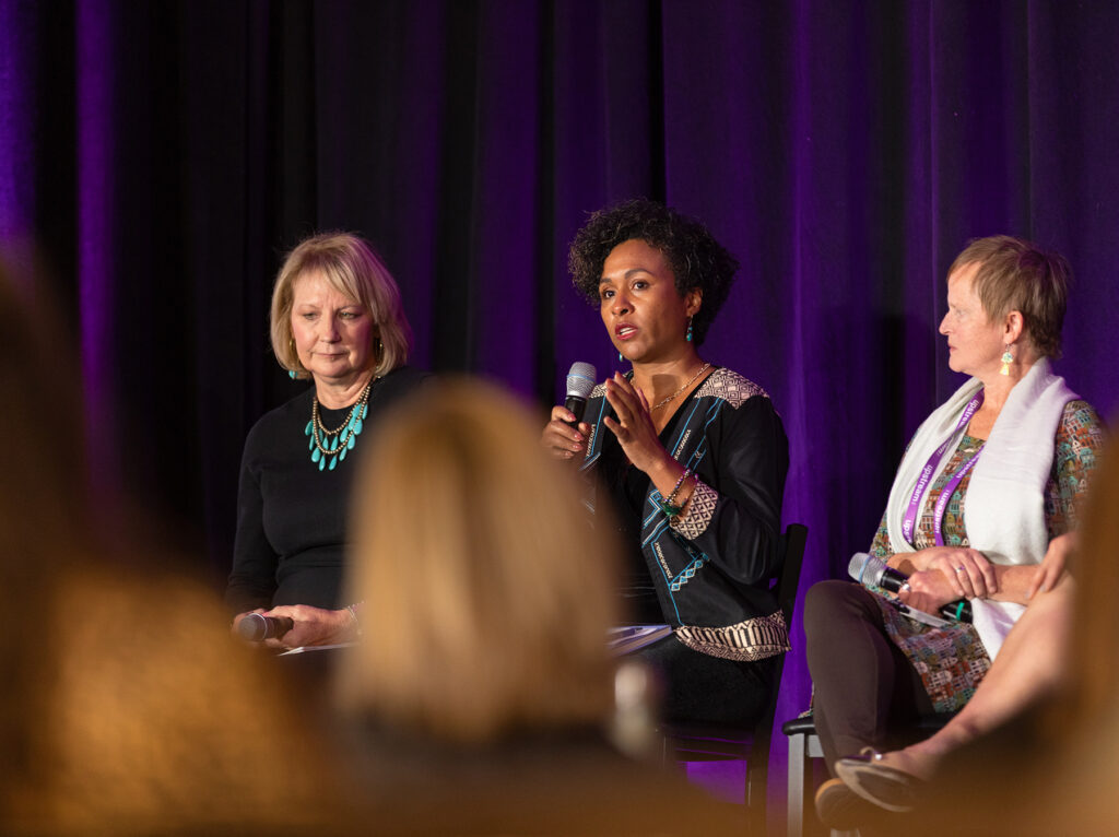 event photography of women speaking on a panel